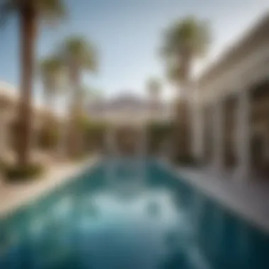 Sparkling pool area at Caesars Palace with cabanas and palm trees