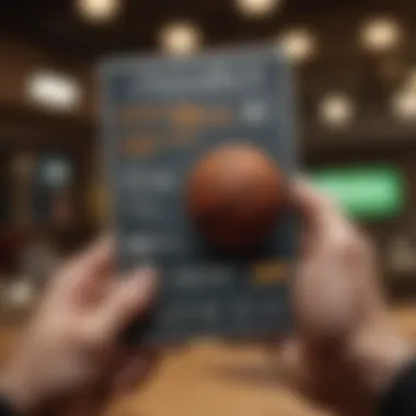 Hand holding a basketball betting odds card