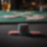 Close-up of poker chips and cards on a felt table